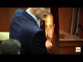 Bloodied Zimmerman photo shown to jury - YouTube