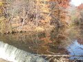 New York Botanical Garden waterfall during fall season