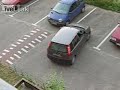 Woman trying to reverse out of parking space. Woman trying to reverse out of parking space.