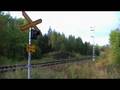 Freight train 4430 passes Pyöree level crossing