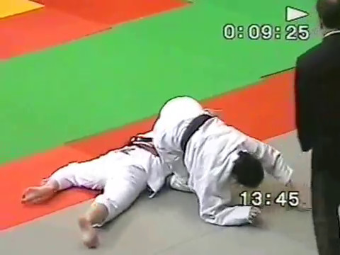 Barefooted judo girls painfull armlock