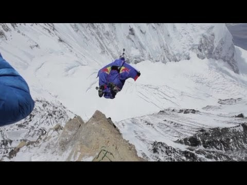 Jump - Russian daredevil Valery Rozov sets a new world record with a base jump 7220 metres above sea level from Mount Everest. The 48-year-old has jumped off the n...