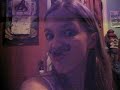 Candace putting a mustash on Hayley