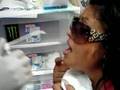 my mom piercing her toung