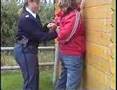 Policewoman arresting girl