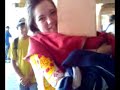 Micaela amarrada no poste