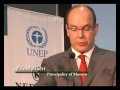Achim Steiner, Executive Director of the United Nations Environment Programme (UNEP), hands over the 