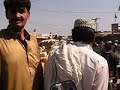 Police escort though village in Pakistan