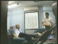 Imagens mostram Arruda recebendo dinheiro que seria para caixa de campanha eleitoral.wmv
