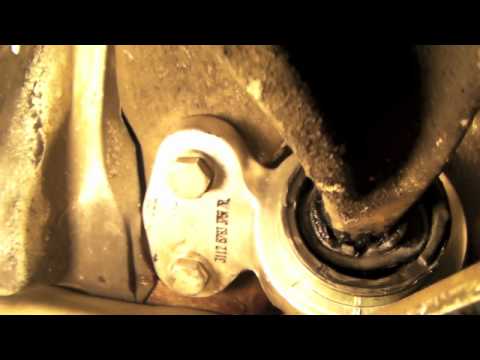 How to replace lower control arm bushings on a BMW 325 ci