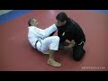 www.bjjweekly.com Ricardo De La Riva shows us how he sets up a basic DLR sweep from guard. Notice how he moves his hips outside of his opponents leg to make room for him to slide in the DLR hook. If you don't make space by moving your hips you may not be able to get the hook set properly. It's important to get the push timing down so make sure to practice plenty of reps. The DLR guard in general relies on a lot of precise positioning and timing, if you are forcing the sweep something isn't right.