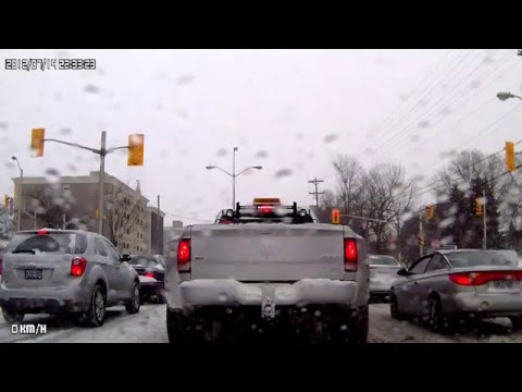 Ottawa - Watch the snow plow pick-up truck driver's aggressive driving as he pushes down his plow twice to throw snow on the Camry. Note: Time and date stamp is incor...