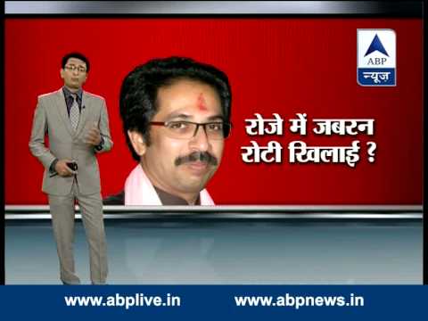 Camera - Caught clearly on camera: Shiv Sena MP Rajan Vichare forcing chapati into Muslim staffer's mouth. Watch the full footage exclusively on ABP News. For latest breaking news, other top stories...