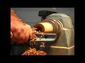 www.PaloArte.com Presents -------------------------------------------------------------------------------------------------------------- USE ALL SAFETY INSTRUMENTS WHILE WORKING ON THE LATHE. I've recorded this video to see the process of hollowing a piece of Olivewood using a 1 Shallow Spindle Gouge. The spindle gouge has been sharpened in a way so it curves after the sharp cutting edge. The cutting edge is about 35 degrees, and the curved sections thereafter increase. The lathe was running at about 800 RPM. The tool is held in such way, so there is a feeling of how the wood is being cut. If there is a feeling of a vibration or high pitch sound, I've turned the tool clockwise; minimizing the cutting. I've prevented extending the cutting edge of the tool out of the hollowed wood; by removing the tool out of the hollowed section, there is a big chance of a nasty catch, which may ruin the wood.