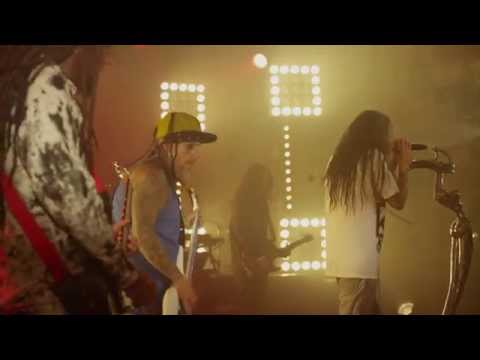 center - An exclusive clip of Korn performing