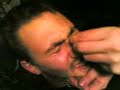 Tom forced down and having his monobrow plucked... ouch!!!
