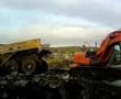 A Gps excavator Hitatchi loading Dumper
