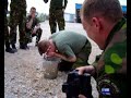 Finnish KFOR soldiers testing pepper gas (OC, oleoresin capsicum) spray in Kosovo spring 2005.