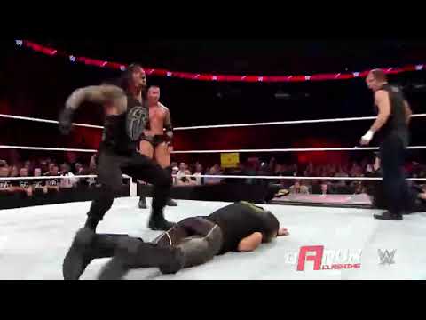 Roman Reigns Spears to Seth Rollins