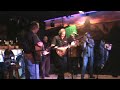 Performed by Asher on his custom, one-of-kind electric mandolin, with Chuck on harmonica, Munroe on flute, Kevin on guitar, Rodney on bass and Tom on drums. Recorded at the Meadows 11/15/09 for Portland Casual Jams.