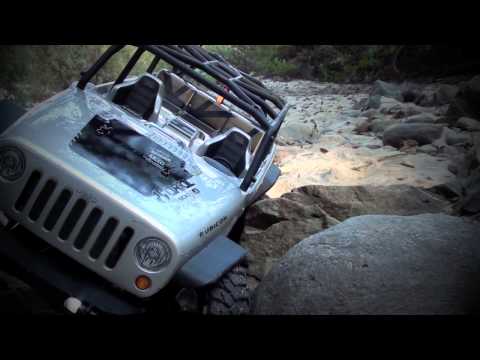 BenderCustoms - Axial SCX10 Jeep Wrangler Unlimited Rubicon out on the trails. Axial's latest release. Running Vanquish 1.9 wheels, 55t Axial motor, 3s Lipo, Castle BEC, Fut...