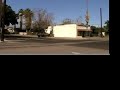 visit http://homepage.mac.com/railfanjunction/railfanjunction.html for more great videos and photos.  this is a shot of up emd sd40t-2 and an early three piece windshield sd60m pulling a cut of cars down south 9th st. in colton, ca.  in the background is a very rare ex- pacific electric wig wag signal protecting the crossing at m street.
