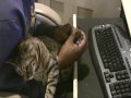 Angry Savannah Cat Gets Claws Trimmed