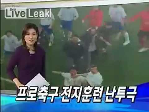 ri soccer_fight - China Beijing Guo'an ( in white) VS South Korea Pohang Steelers (in red) , 10th February, 2010 . Koreans started the fight, unfortunately they got s**t beate...