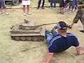 Tank runs over man.