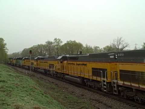 locomotive - BNSF 5840 heads west through Colona, IL heading for Silvis to drop off these 35 SD40-2 units. This was amazing to see. They just kept coming and coming! Ha.