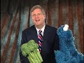 Secretary Tom Vilsack talks with Cookie Monster