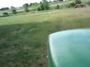 John Deere cruising through the yard