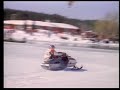 Click here to watch this video Vintage Snowmobiler Towing Skiers into Water by Warren Miller