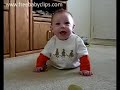 cute baby pretends hes superman