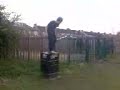 retard falls off of a bin