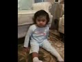 Cute London baby and her louis vuitton iphone