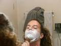 Shaving the traditional way using a straight razor