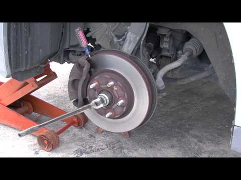 how to remove drive axle hub nut