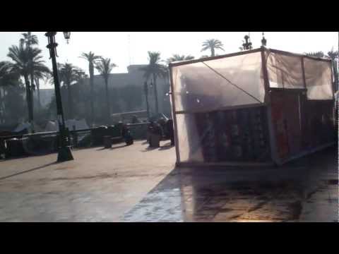 tahrir tents - The encampment (demanding the military hand power to a civilian government) continues, getting grubbier and yet more settled in -- note the structure made of...