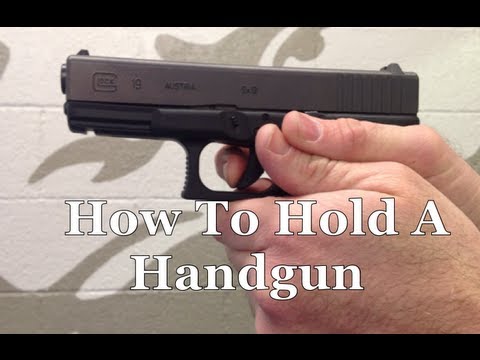 how to properly hold a handgun