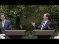 Prime minister David Cameron and deputy prime minister Nick Clegg share a joke . . Follow us on twitter at twitter.com .