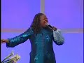 beverly crawford singing at the 80-50 gala celebration.