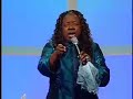 beverly crawford singing at the 80-50 gala celebration.