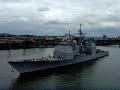 USS Mobile Bay (CG-53) being turned around in narrow river USS Mobile Bay (CG-53) being turned around in narrow river