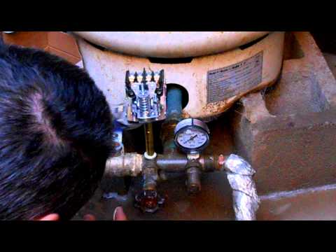 how to drain well tank