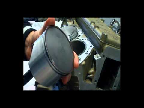 How to install Outboard Pistons when rebuilding your outboards motor
