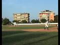 Catcher Forna gets an out at home plate