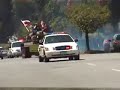 T55 tank running down Vancouver city streets with police