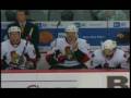 Jarkko Ruutu goes bitin' tyson on Andrew Peters of buffalo