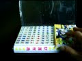 this mini size mah jongg tiles set contains 146 tiles(2 of them are blank white), 3 dices and 4 plastic racks. best choice for travel playing. source: www.sourcingmap.com